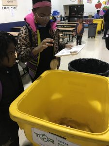 Kids at Carver love to compost! 
